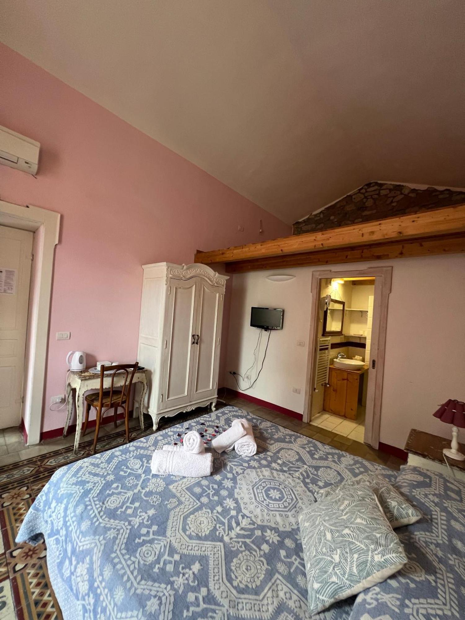 Corso 41 Hotel Bosa Bagian luar foto