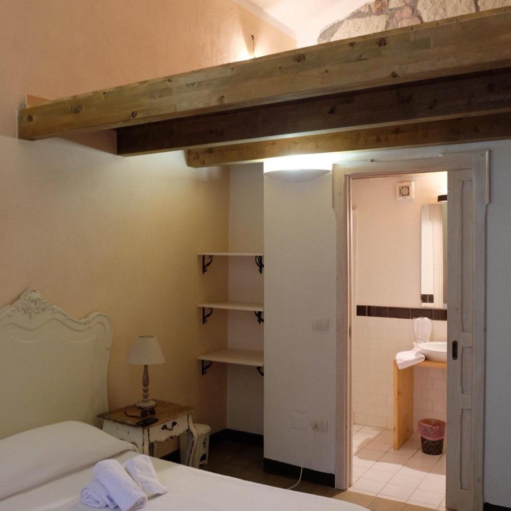 Corso 41 Hotel Bosa Bagian luar foto